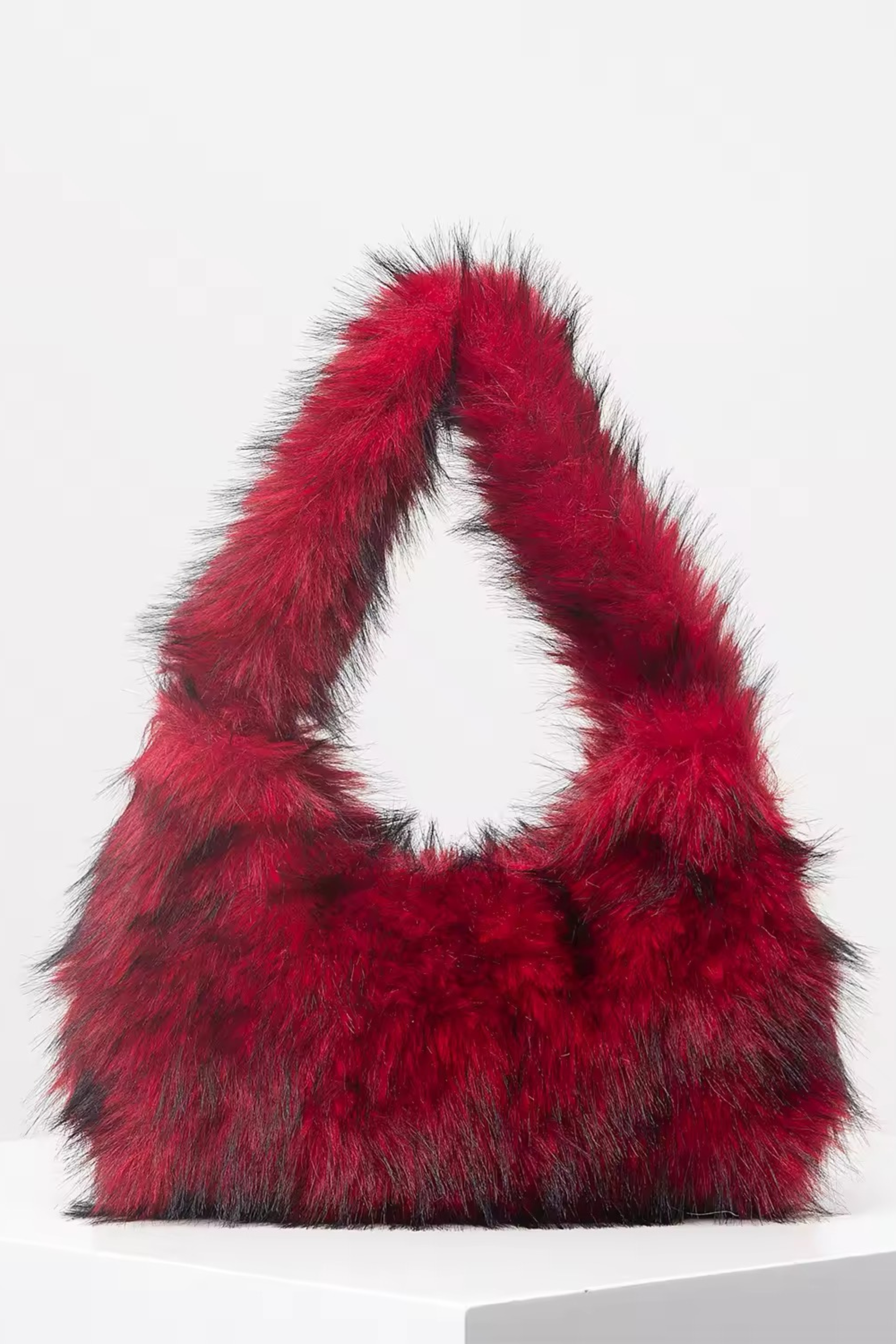 BIANCA - Beuteltasche mit Fell-Effekt