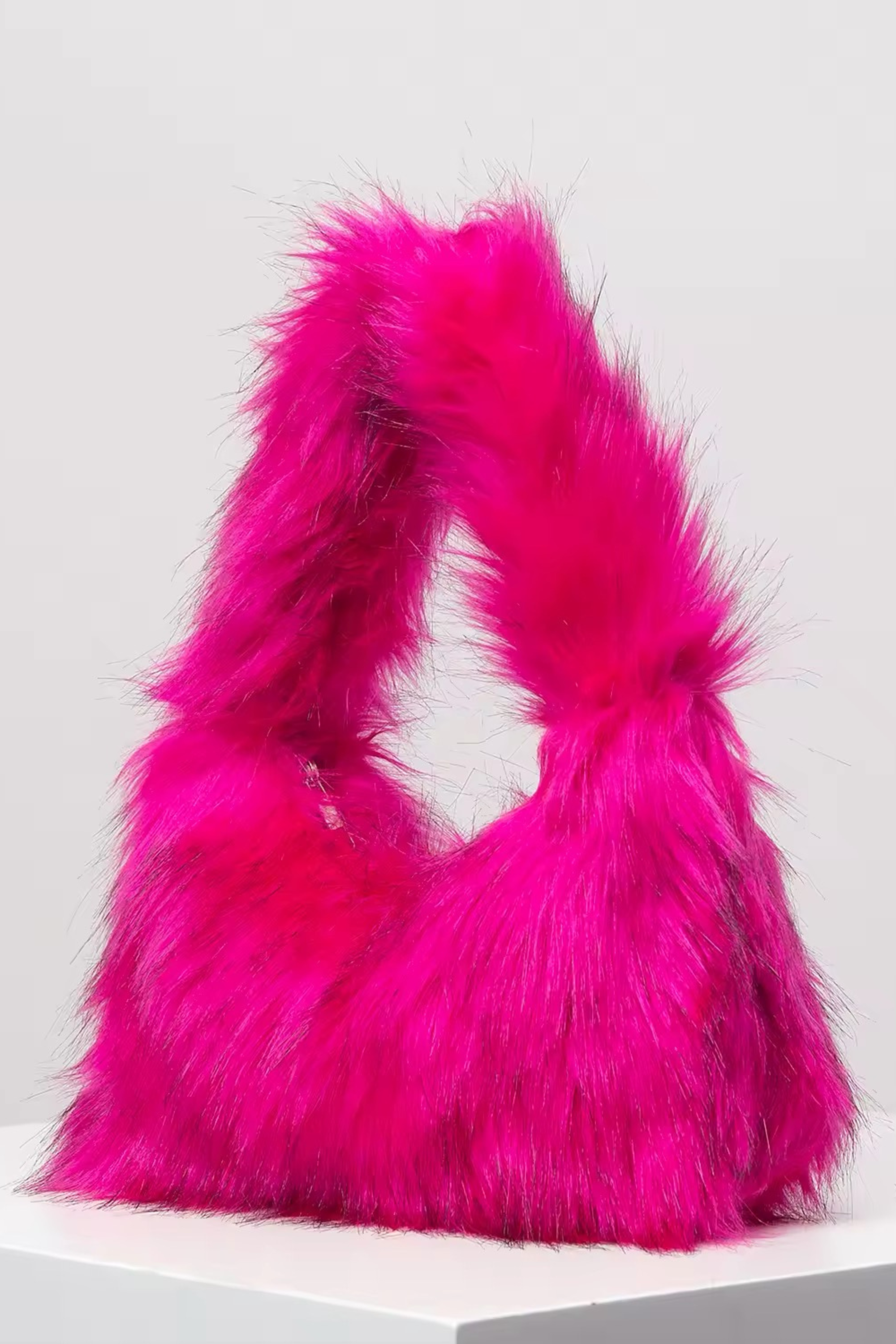 BIANCA - Beuteltasche mit Fell-Effekt