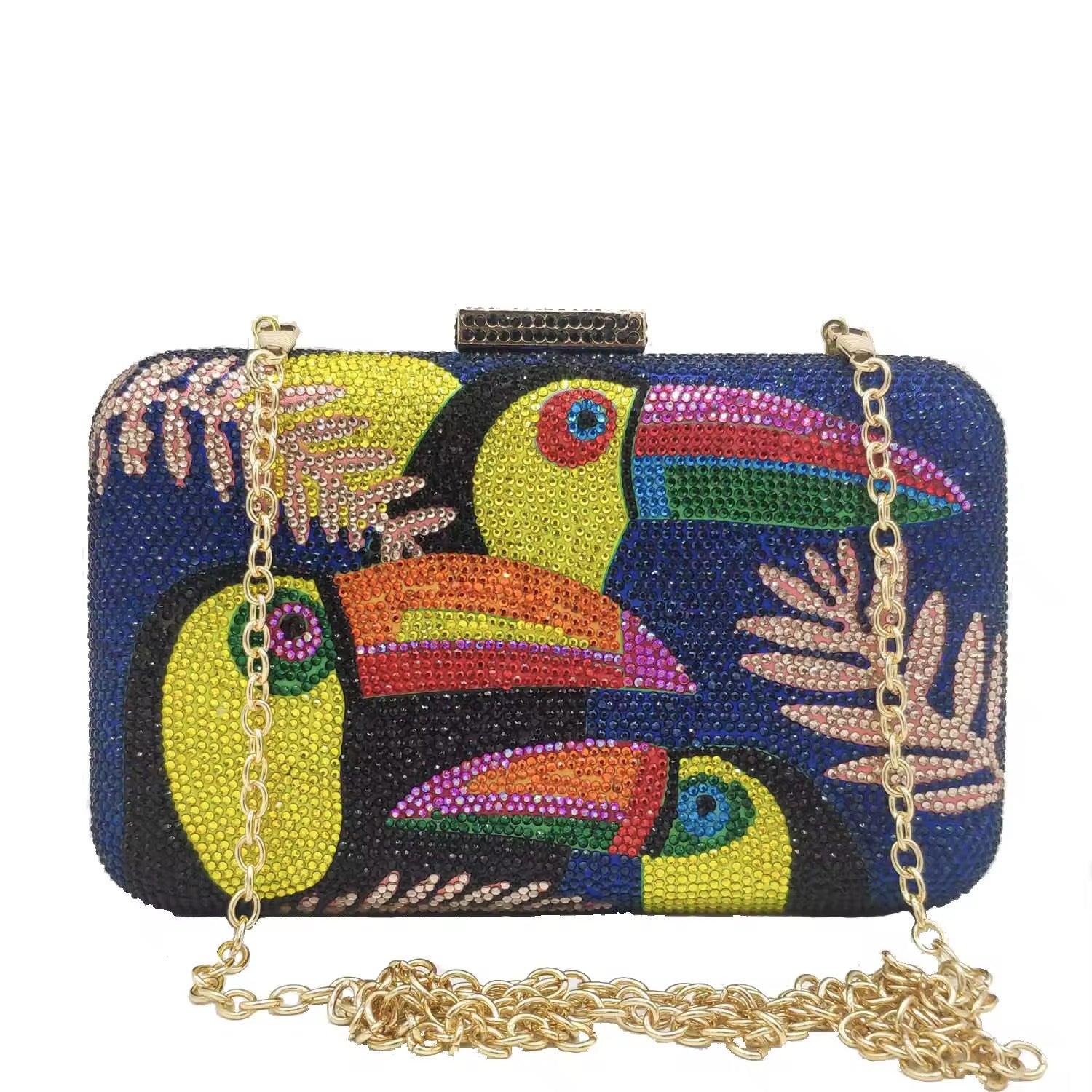 ŌMU – Strassbesetzte Clutch mit Toucan-Motiv