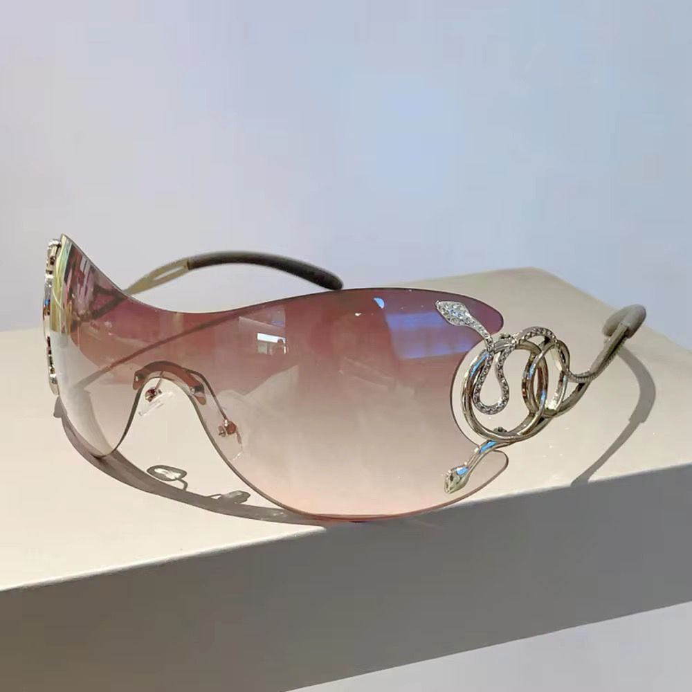 ROBERTA - Oversize Sonnenbrille mit Schlangendetails