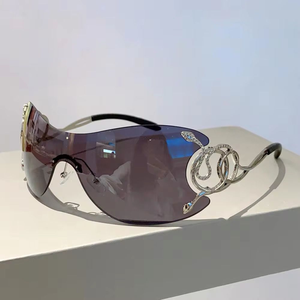 ROBERTA - Oversize Sonnenbrille mit Schlangendetails