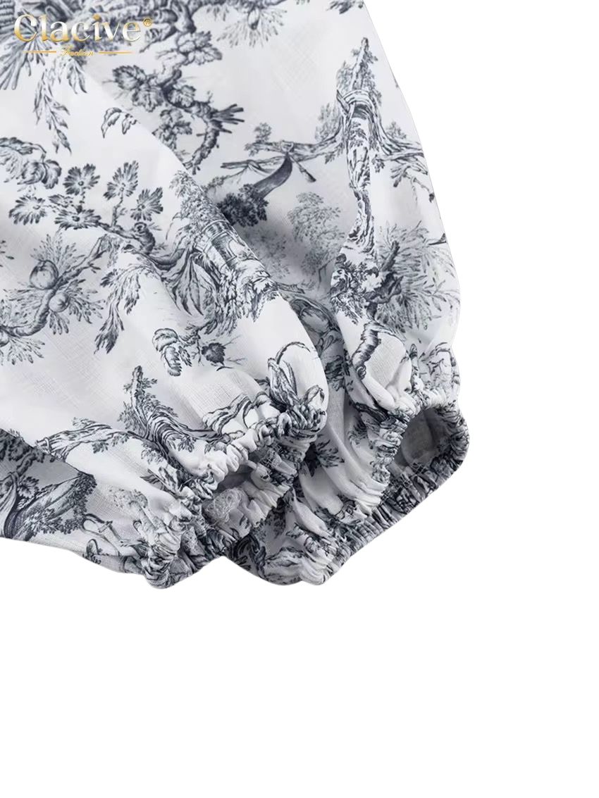 DEYNA - Kurzes Langarmkleid mit luxuriösem Muster