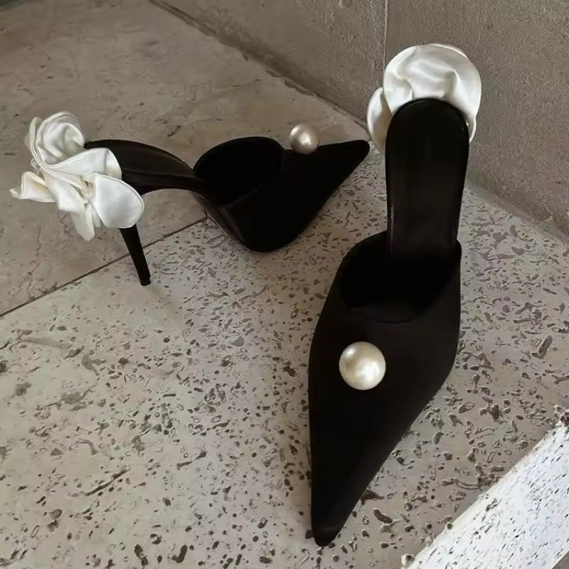 MAGDA - Heeled mule with statement flower and pearl embellishment